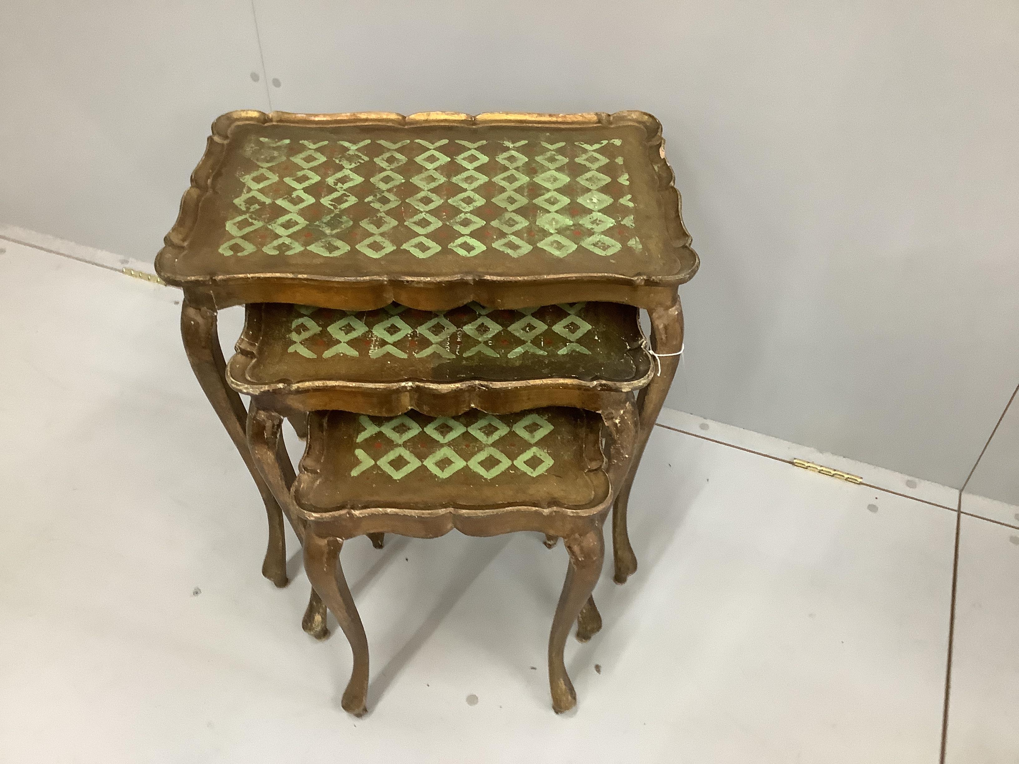 A nest of three Italian giltwood tea tables, width 56cm, depth 36cm, height 58cm